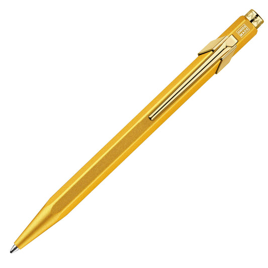 Caran d'Ache 849: Ballpoint Pen, Gold Bar in slimpack, blue refill